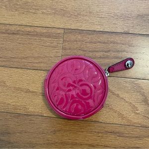 Cute pink patent leather COACH coin purse. Barely used.